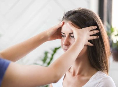 Woman is getting physical therapy from a professional doctor